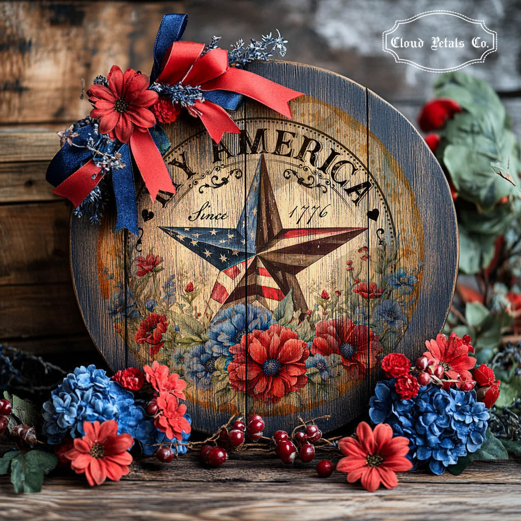 Decorative sign with American flag star and floral elements on a wooden background.