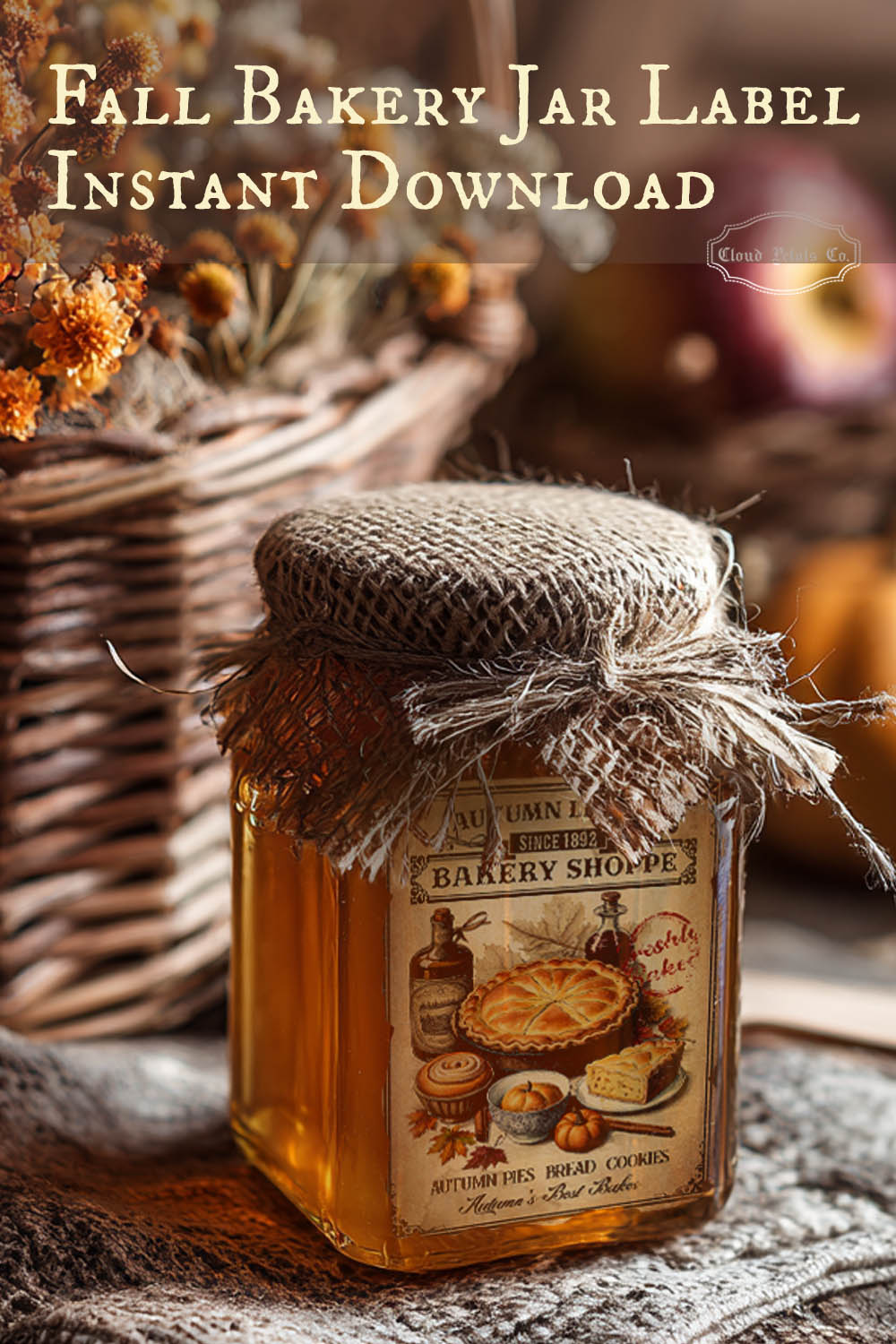 Jar with a bakery-themed label on a rustic background with pumpkins and a basket.