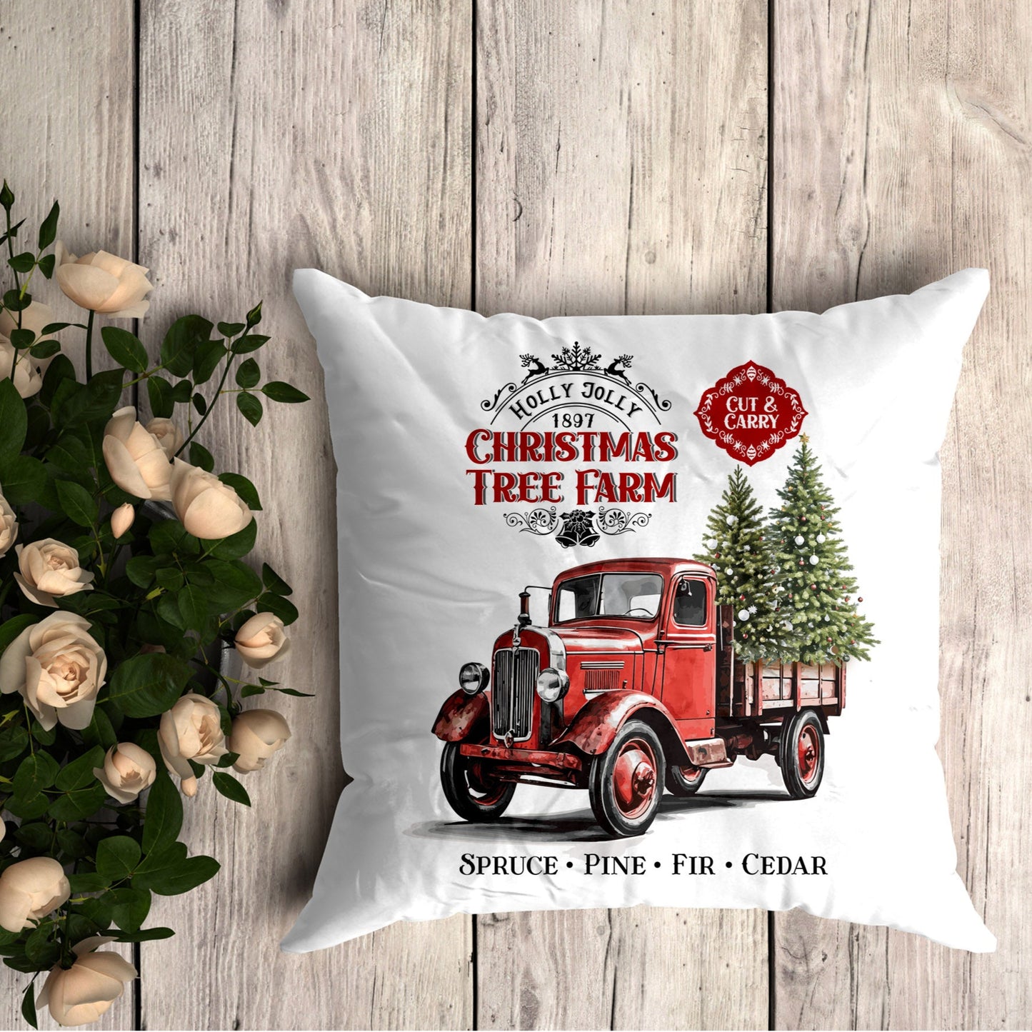 Decorative pillow with vintage truck and Christmas tree design on a wooden background