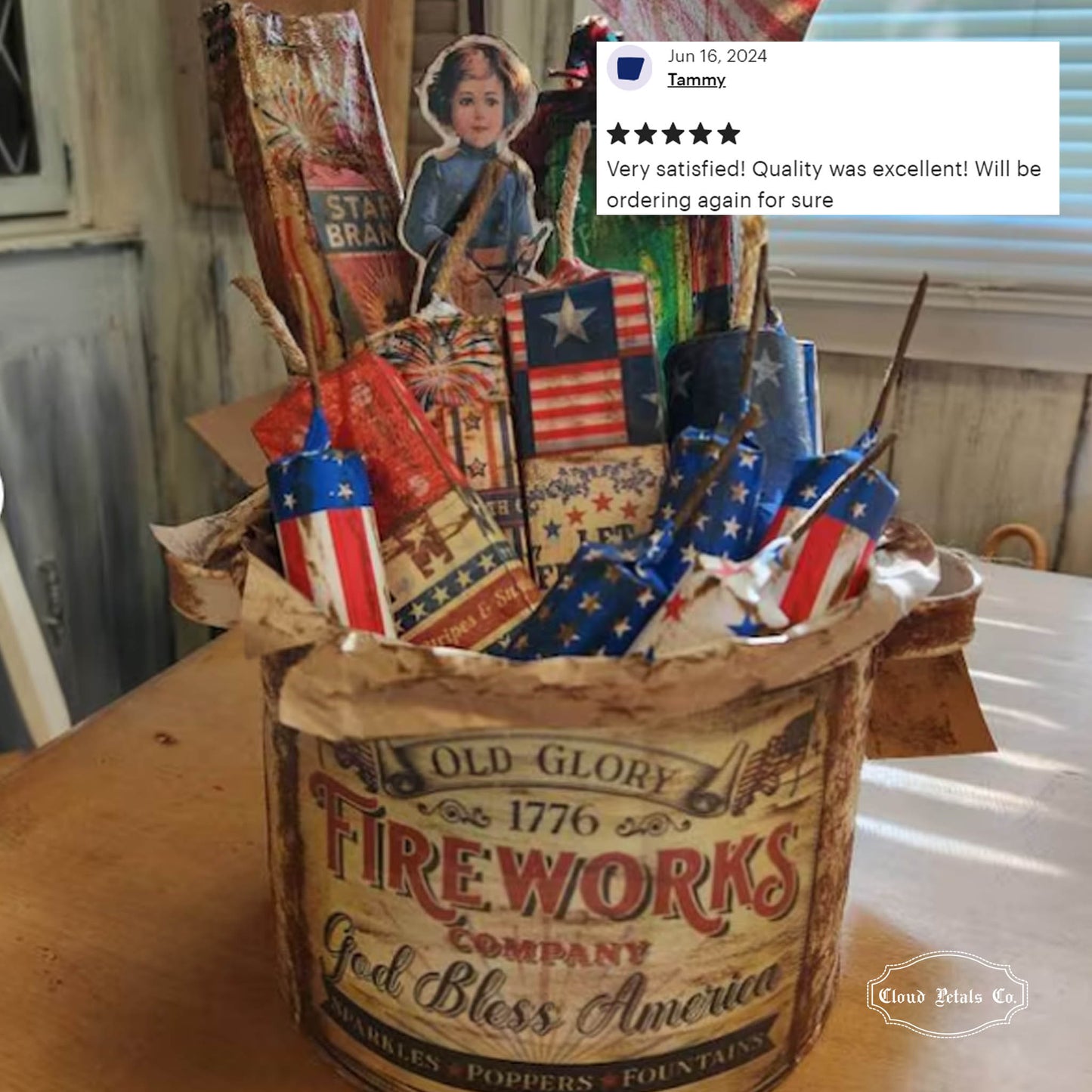 Bouquet of patriotic items in a decorative container with a customer review overlay.