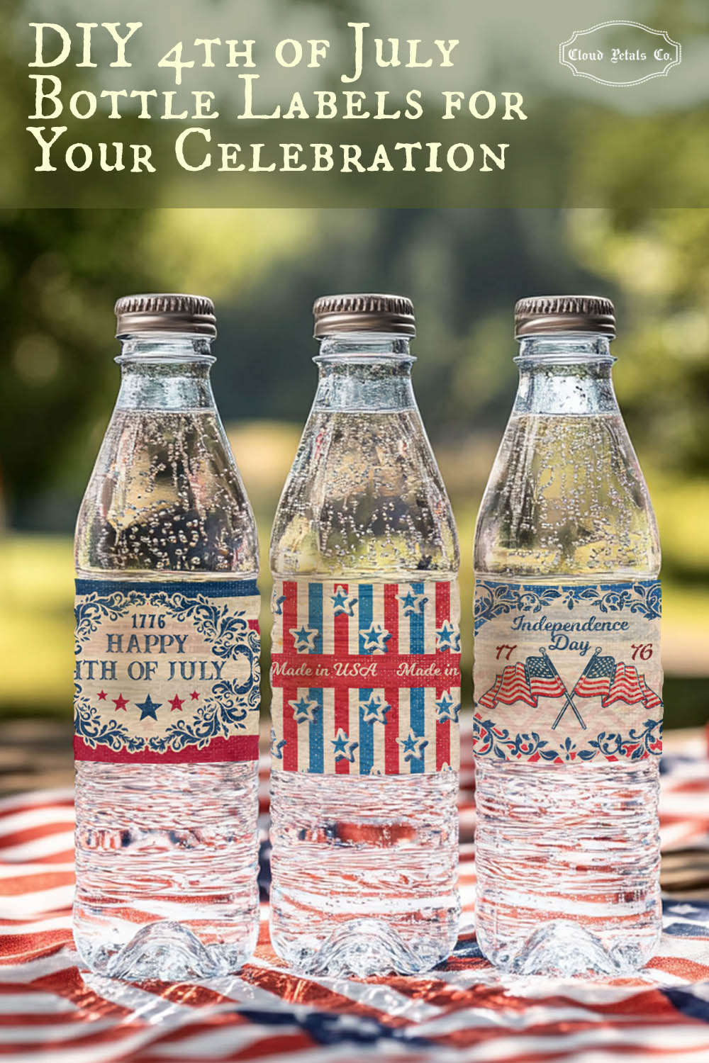 Three bottles with DIY 4th of July bottle labels on a tablecloth outdoors.