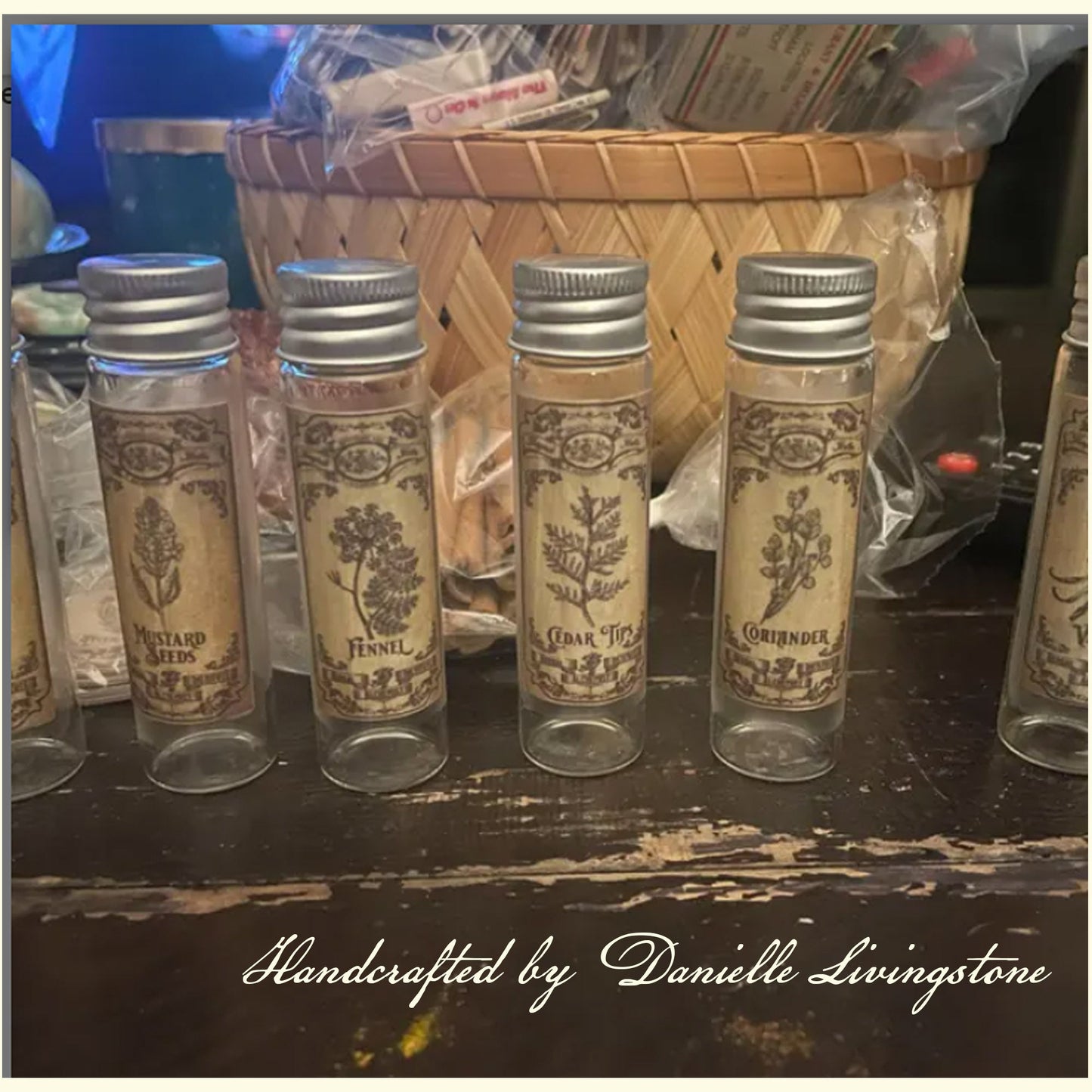 Vintage-style apothecary labels on clear bottles with a decorative border.