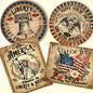 A set of four vintage style 4th of July labels with various designs including the Liberty Bell, an eagle, the Statue of Liberty, and a floral arrangement with the American flag.